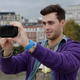 Illustration for article titled Attractive Young Men Smiling at the PlayStation Vita